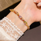 ✨Kaufe 1, erhalte 1 gratis💎 Retro Crossover Gedrehtes Mehrfarbiges Zirkon Verstellbares Armband für Damen